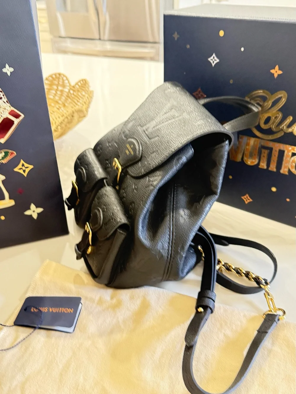 Louis Vuitton Black Monogram Embossed Leather Backpack with Gold Chain Straps